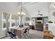 Bright living space with large windows, a dining table, and access to the living room at 536 Castle Hall Rd, Mount Pleasant, SC 29464