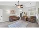 Spacious living room with plush seating, a ceiling fan, and plenty of natural light at 536 Castle Hall Rd, Mount Pleasant, SC 29464