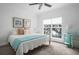 Inviting bedroom featuring a large window, comfortable bed, and stylish decor at 700 Daniel Ellis Dr # 8108, Charleston, SC 29412