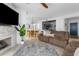 Bright living area with fireplace opens to dining and kitchen, creating an inviting space at 700 Daniel Ellis Dr # 8108, Charleston, SC 29412