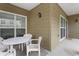 Outdoor patio with a table and chairs, perfect for enjoying the fresh air, with convenient access to the indoors at 700 Daniel Ellis Dr # 8108, Charleston, SC 29412