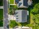 Overhead view of a residential property, showing the roof, yard, driveway, and surrounding neighborhood at 7217 Mossy Creek Ln, Hanahan, SC 29410