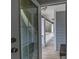 A cozy back porch features a seating area and natural light at 7217 Mossy Creek Ln, Hanahan, SC 29410