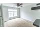An empty bedroom with carpeted floors, light blue walls, and base board molding at 7217 Mossy Creek Ln, Hanahan, SC 29410