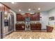An open kitchen with stainless appliances and granite countertops at 7217 Mossy Creek Ln, Hanahan, SC 29410