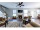 Bright living room featuring a fireplace and comfortable seating at 7217 Mossy Creek Ln, Hanahan, SC 29410