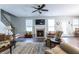 Bright living room featuring a fireplace and comfortable seating at 7217 Mossy Creek Ln, Hanahan, SC 29410