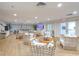 Relaxing living area features cozy seating, a flat-screen TV, and stylish decor for comfortable gatherings at 1126 Ocean Blvd # 203, Isle of Palms, SC 29451