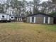 Charming brick home with a well-maintained lawn and mature trees providing shade and curb appeal at 113 Ford Ct, Summerville, SC 29483