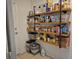 Organized pantry shelves with a variety of food items and storage containers offer ample storage space at 113 Ford Ct, Summerville, SC 29483