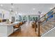Spacious open-concept kitchen featuring quartz countertops, stainless appliances, and hardwood floors with a great layout at 1168 Reserve Ln, Awendaw, SC 29429