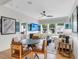 Open-concept living room with modern furniture, stylish decor, and lots of natural light at 1168 Reserve Ln, Awendaw, SC 29429