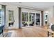 Bright indoor living space with access to a comfortable covered outdoor patio seating area at 1168 Reserve Ln, Awendaw, SC 29429
