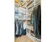 Well-organized walk-in closet with custom shelving, providing plenty of storage space for an organized wardrobe at 118 Cooper River Dr, Mount Pleasant, SC 29464