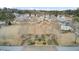 A view shows single Gathering homes overlooking a central green space with landscaping and park structures at 129 Sabal Ct, Summerville, SC 29483