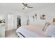 This large, open bedroom has two closets, ensuite bathroom, and neutral decor at 129 Sabal Ct, Summerville, SC 29483