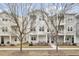 Charming exterior of a modern townhome featuring a welcoming front porch and an American flag at 129 Sabal Ct, Summerville, SC 29483