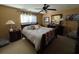 Cozy bedroom featuring a queen-sized bed, ceiling fan, and matching nightstands at 1303 Basketweaver Way, Hanahan, SC 29410