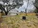View of the fenced backyard with firepit at 1508 Greenbay Dr, North Charleston, SC 29406