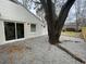 View of the side of the house and gravel backyard at 1508 Greenbay Dr, North Charleston, SC 29406