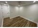 This bedroom features natural light, a ceiling fan, and hardwood floors at 1508 Greenbay Dr, North Charleston, SC 29406