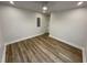 Spacious room with wood-look flooring and white trim at 1508 Greenbay Dr, North Charleston, SC 29406