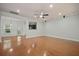 Expansive living room with hardwood floors, recessed lights, and abundant natural light at 1706 Restoration Ct, Charleston, SC 29414