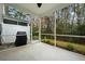 Relaxing screened porch overlooking a green backyard at 1706 Restoration Ct, Charleston, SC 29414