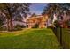 Expansive backyard with lush green lawn, trees, and fence, perfect for outdoor enjoyment at 1756 Indigo Island Dr, Hanahan, SC 29410