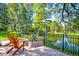 Secluded backyard with a brick patio, fire pit, and scenic views of the tranquil water at 1756 Indigo Island Dr, Hanahan, SC 29410