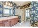 Bathroom features a vanity with sink and mirror, shower with glass door and toilet at 1756 Indigo Island Dr, Hanahan, SC 29410