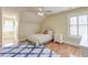 Bedroom with hardwood floors, ceiling fan and a large window at 1756 Indigo Island Dr, Hanahan, SC 29410