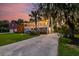 Charming two-story home with a well-manicured lawn, landscaping, and a spacious driveway at 1756 Indigo Island Dr, Hanahan, SC 29410
