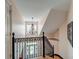 Foyer featuring soaring ceilings, a chandelier, and wrought iron banister at 1756 Indigo Island Dr, Hanahan, SC 29410