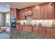 Modern kitchen with granite countertops, stainless appliances and custom cabinets at 1756 Indigo Island Dr, Hanahan, SC 29410