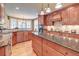 Spacious kitchen featuring granite countertops, custom cabinetry, and modern appliances at 1756 Indigo Island Dr, Hanahan, SC 29410