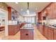 Gourmet kitchen with an island, stainless steel appliances, and custom cabinetry at 1756 Indigo Island Dr, Hanahan, SC 29410