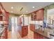 Well-equipped kitchen with granite counters, custom cabinets, and a functional center island at 1756 Indigo Island Dr, Hanahan, SC 29410