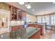 Gourmet kitchen featuring granite countertops, stainless steel appliances, and custom cabinetry at 1756 Indigo Island Dr, Hanahan, SC 29410
