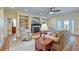 Inviting living room with a cozy fireplace, built-in shelving, and French doors leading to outdoor space at 1756 Indigo Island Dr, Hanahan, SC 29410