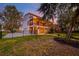 Back exterior view featuring a spacious screened porch, fenced yard and a two-story house at 1756 Indigo Island Dr, Hanahan, SC 29410