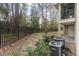 View of a backyard with privacy fence and lush green foliage surrounding the home at 1860 Montclair Dr # 1860-A, Mount Pleasant, SC 29464