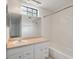 Bathroom featuring white vanity with large mirror, shower with white tiling and track lighting at 1860 Montclair Dr # 1860-A, Mount Pleasant, SC 29464
