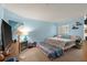 Light blue bedroom showcasing a bed and decorative wall art at 1860 Montclair Dr # 1860-A, Mount Pleasant, SC 29464