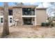 Back of home featuring balconies with plants and neutral siding at 1860 Montclair Dr # 1860-A, Mount Pleasant, SC 29464