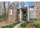 Charming condo building featuring brick and siding exterior with landscaped grounds and visible unit number at 1860 Montclair Dr # 1860-A, Mount Pleasant, SC 29464