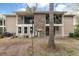 Exterior shot of a two-story condo building with wood and brick elements at 1860 Montclair Dr # 1860-A, Mount Pleasant, SC 29464