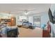 Spacious living room featuring comfortable seating, a kitchen pass-through and sliding glass door access to the outside at 1860 Montclair Dr # 1860-A, Mount Pleasant, SC 29464