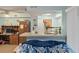 Open living space with comfortable seating and a pass-through bar leading to the kitchen, creating an inviting atmosphere at 1860 Montclair Dr # 1860-A, Mount Pleasant, SC 29464