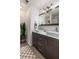 Bathroom features double sinks and modern vanity at 1916 Gasque St, Johns Island, SC 29455